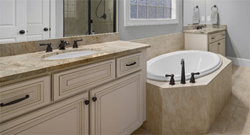 Bathroom with taps and bath tub